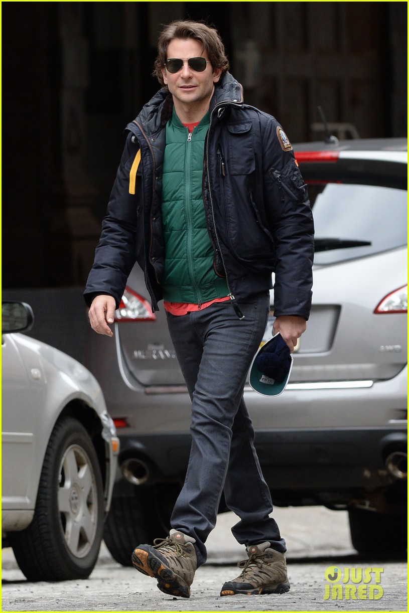 Bradley Cooper ran from the paparazzi while walking to a performance of "The Elephant Man" in Manhattan