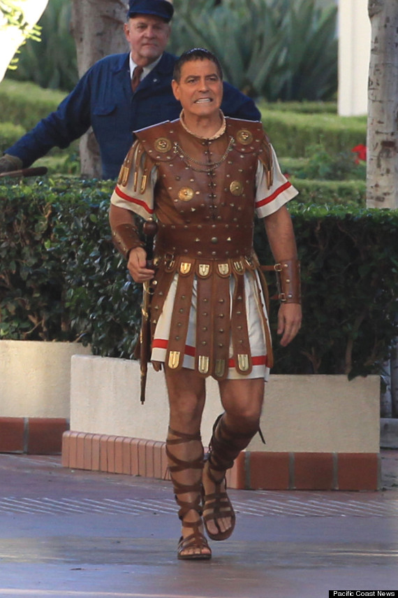 George Clooney dressed as a gladiator seen coming out of a taxi cab while filming scenes for the movie "Hail Caesar" at Union Station