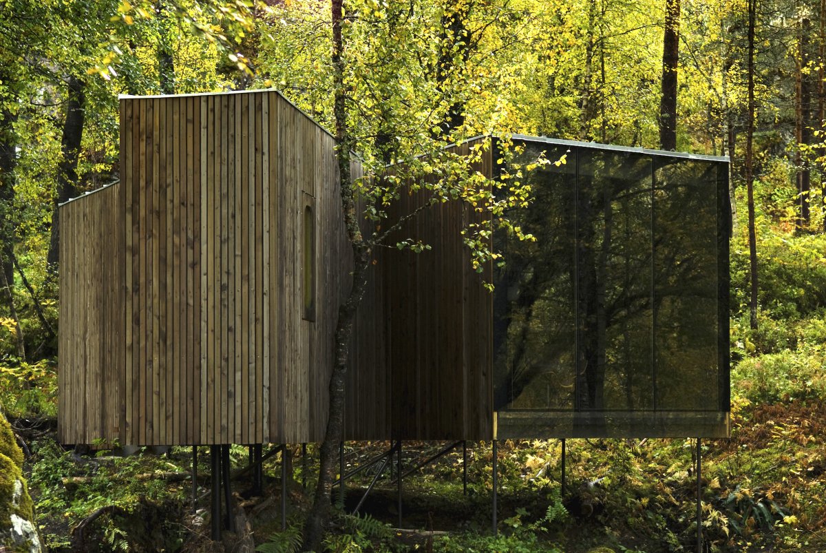 the-juvet-hotel-is-made-up-of-nine-wood-paneled-pods-scattered-throughout-the-woods-ownerknut-slinning-tells-business-insider-two-guests-can-stay-in-each-pod