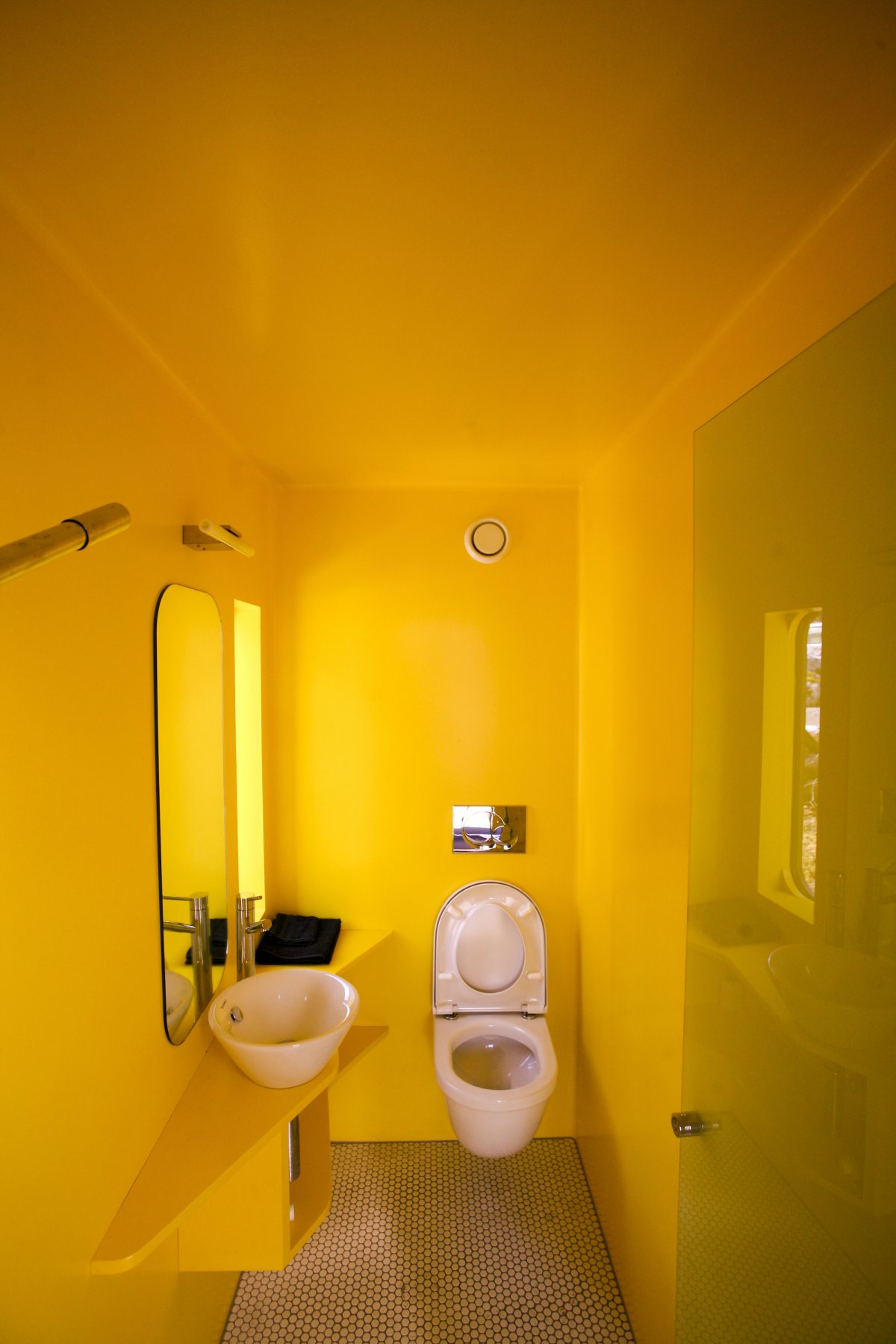 the-pods-bathrooms-are-also-brighter-than-the-drab-ones-in-the-film